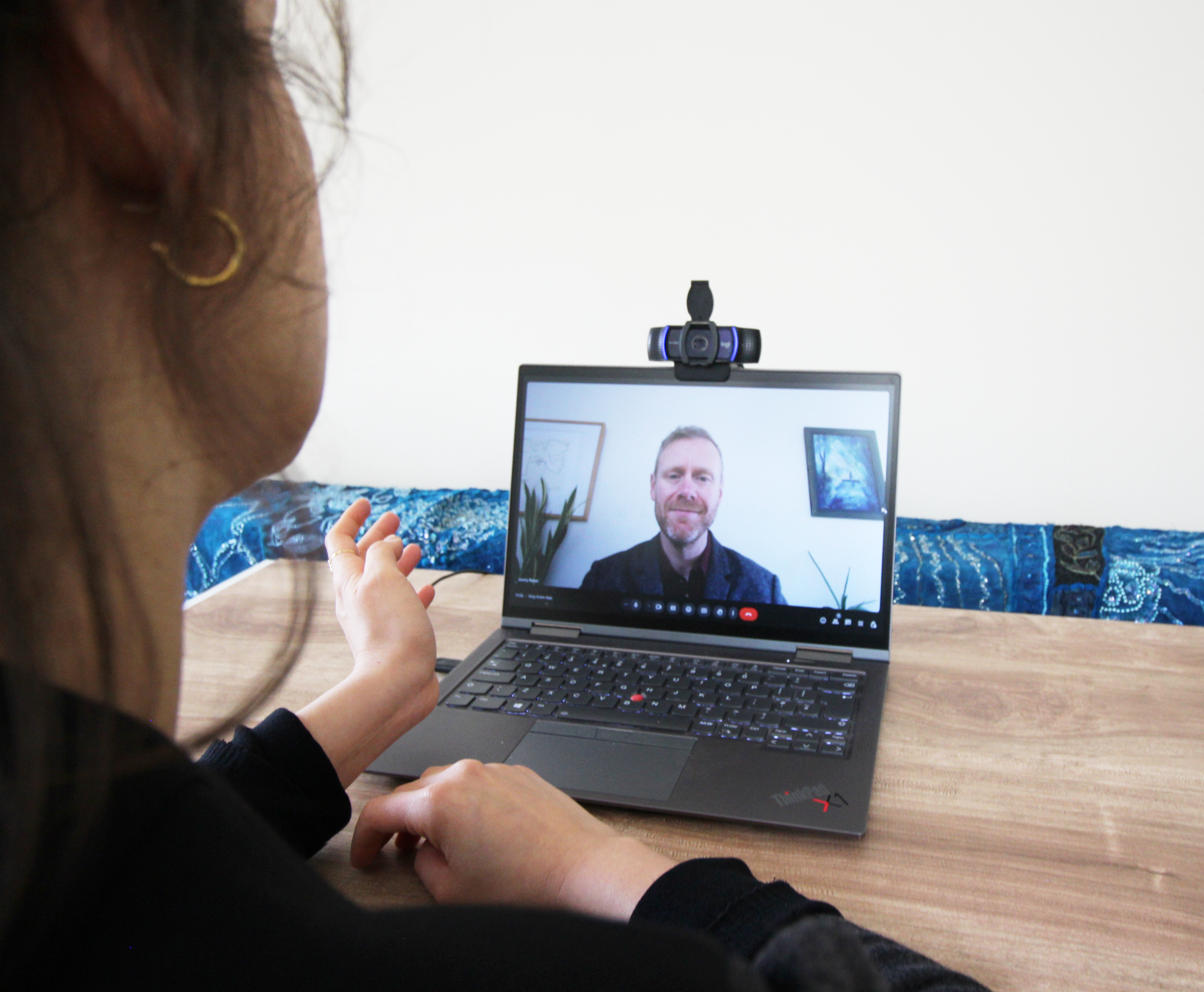 A client accessing online integrative hypno-therapy for anxiety about life-meaning challenges with Jonny Baker, in the UK