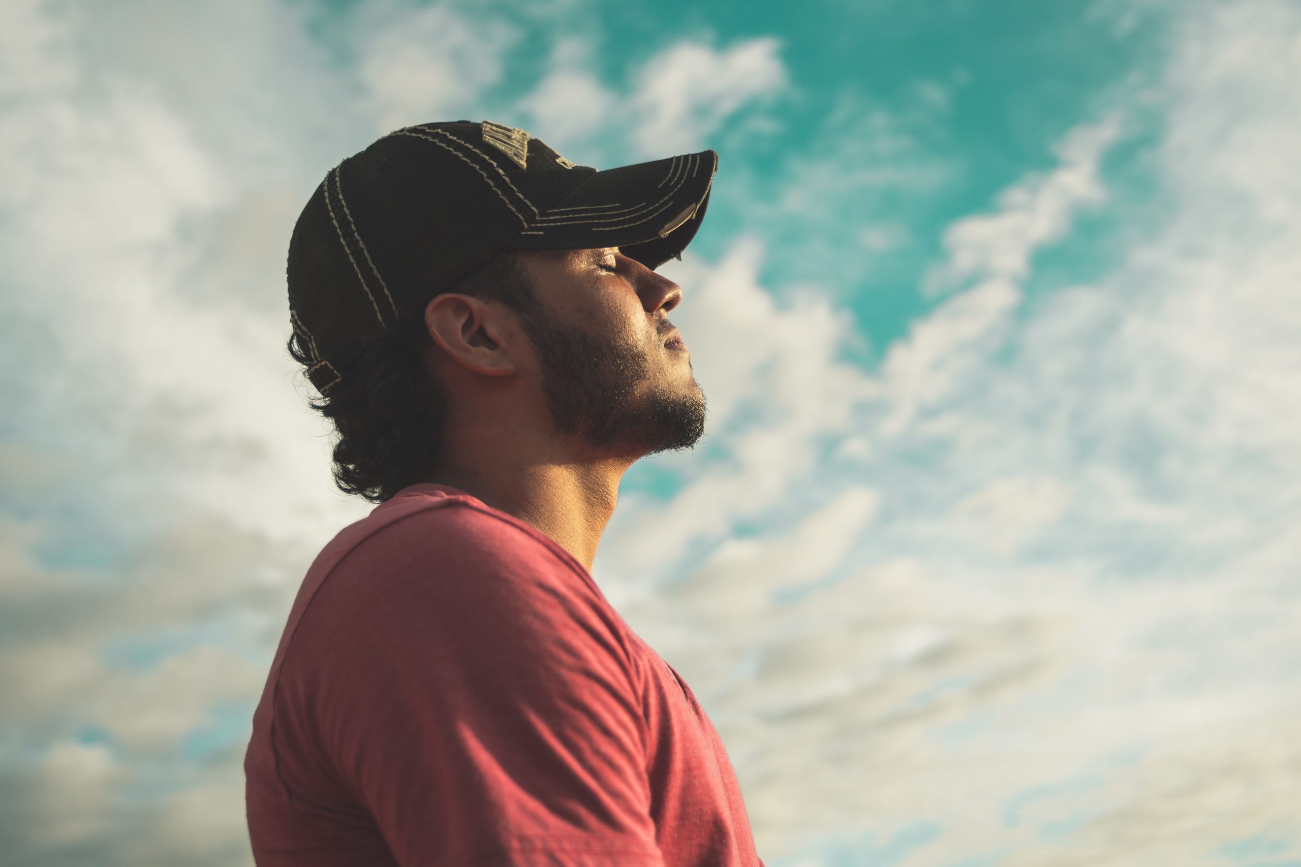 A man breathing fresh clean air, indicating overcoming a smoking or vaping addiction using an online course